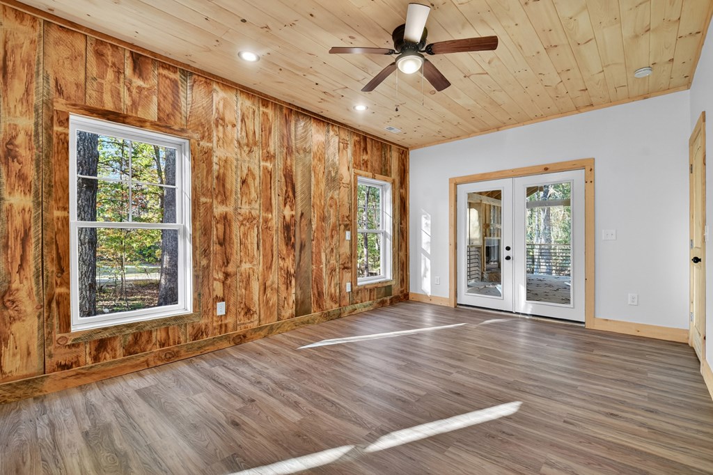 646 High Country Crossing Morganton, GA 30560 - Photo 30 of 44 a view of an empty room with a window and wooden floor