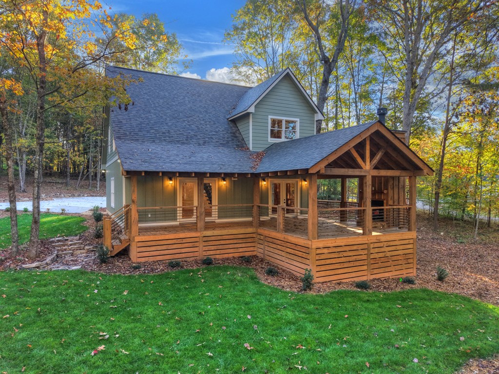 646 High Country Crossing Morganton, GA 30560 - Photo 5 of 44 a front view of a house with a yard