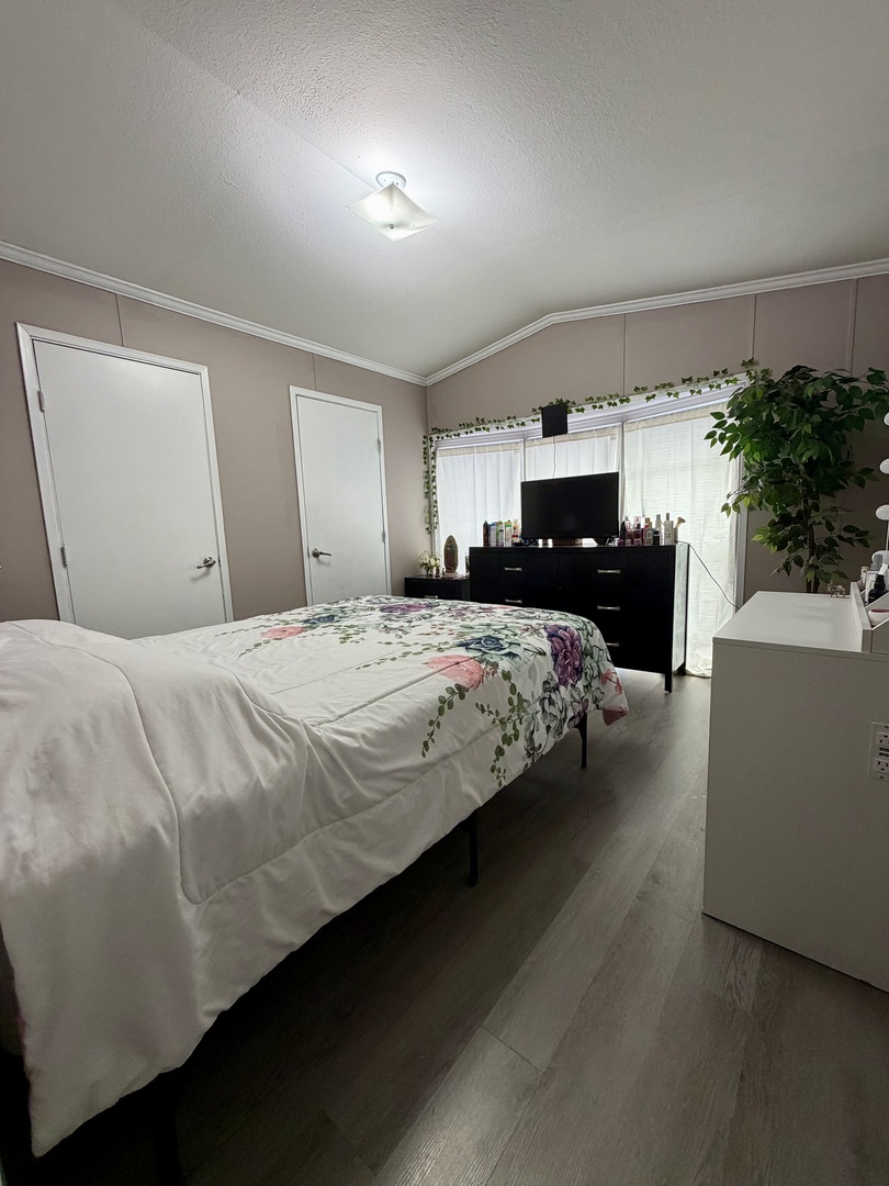 8800 South Harlem Avenue, Unit 2111 Bridgeview, IL 60455 - Photo 7 of 11 a bedroom with a bed and a couch