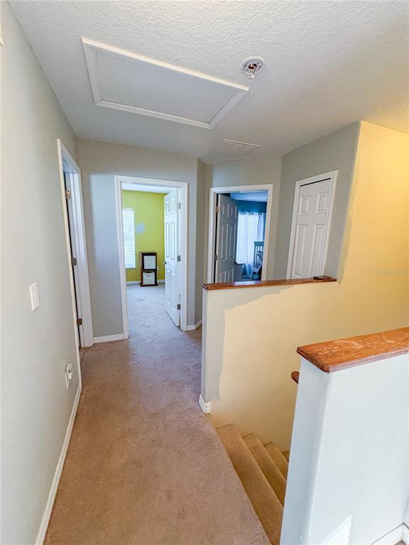 12715 Saulston Place Hudson, FL 34669 - Photo 30 of 44 a view of a room with wooden floor and a sink