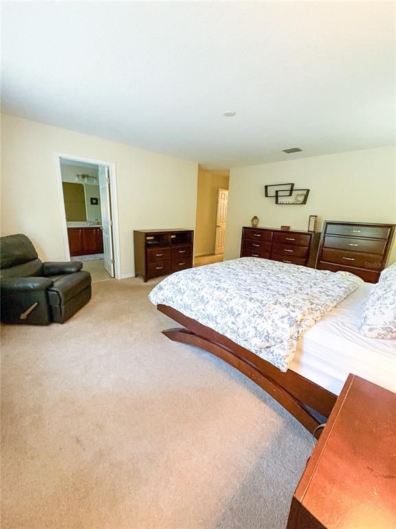 12715 Saulston Place Hudson, FL 34669 - Photo 33 of 44 a living room with furniture