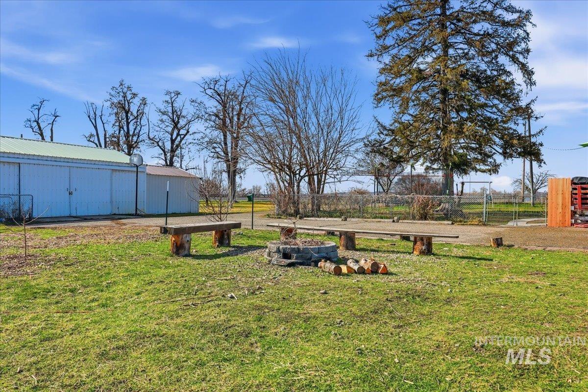 148 Glascock Road Weiser, ID 83672 - Photo 32 of 32 View of yard with an outdoor structure and a pole building