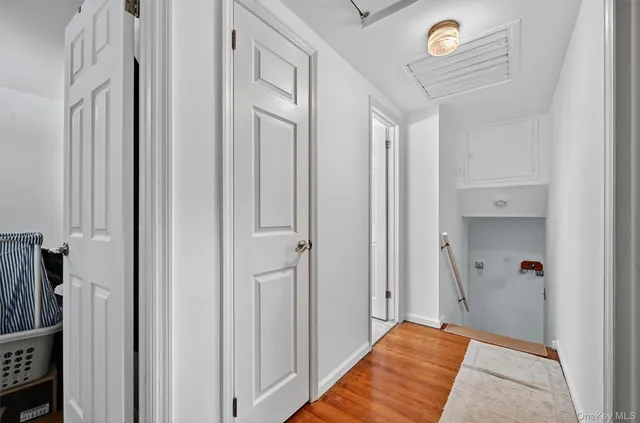 a view of a bedroom from a hallway