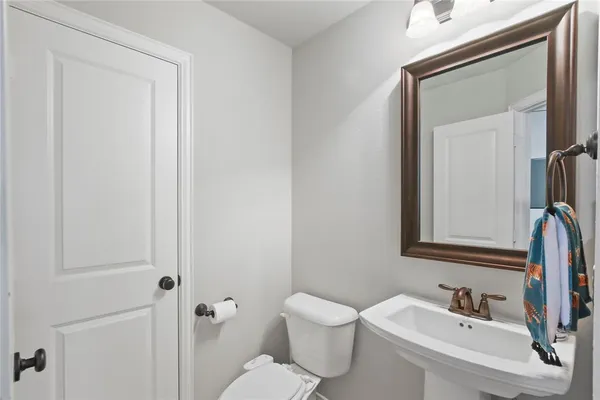 a view of a patio with a table and a fireplace