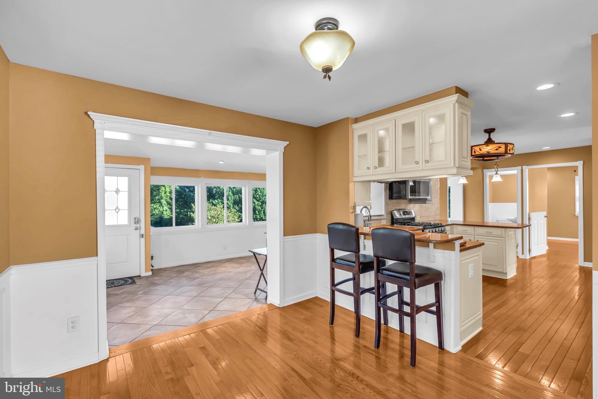 721 Rancocas Avenue Riverside, NJ 08075 - Photo 14 of 56 a view of a dining room with furniture window and wooden floor