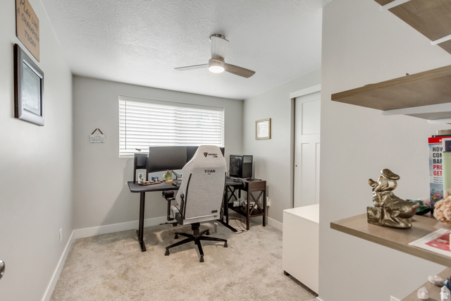 48 Moon Ridge Drive Murray, UT 84107 - Photo 16 of 30 Bedroom featuring neutral-toned walls, carpeted flooring, a window with horizontal blinds, a ceiling fan, and a white sliding closet door