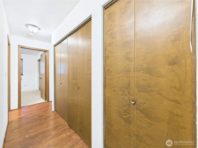 a view of a bathroom from a hallway