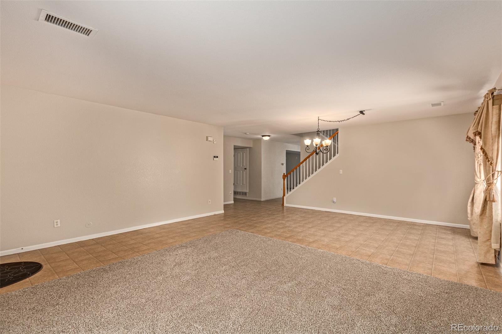 5344 North Perth Street Denver, CO 80249 - Photo 14 of 39 a view of an empty room