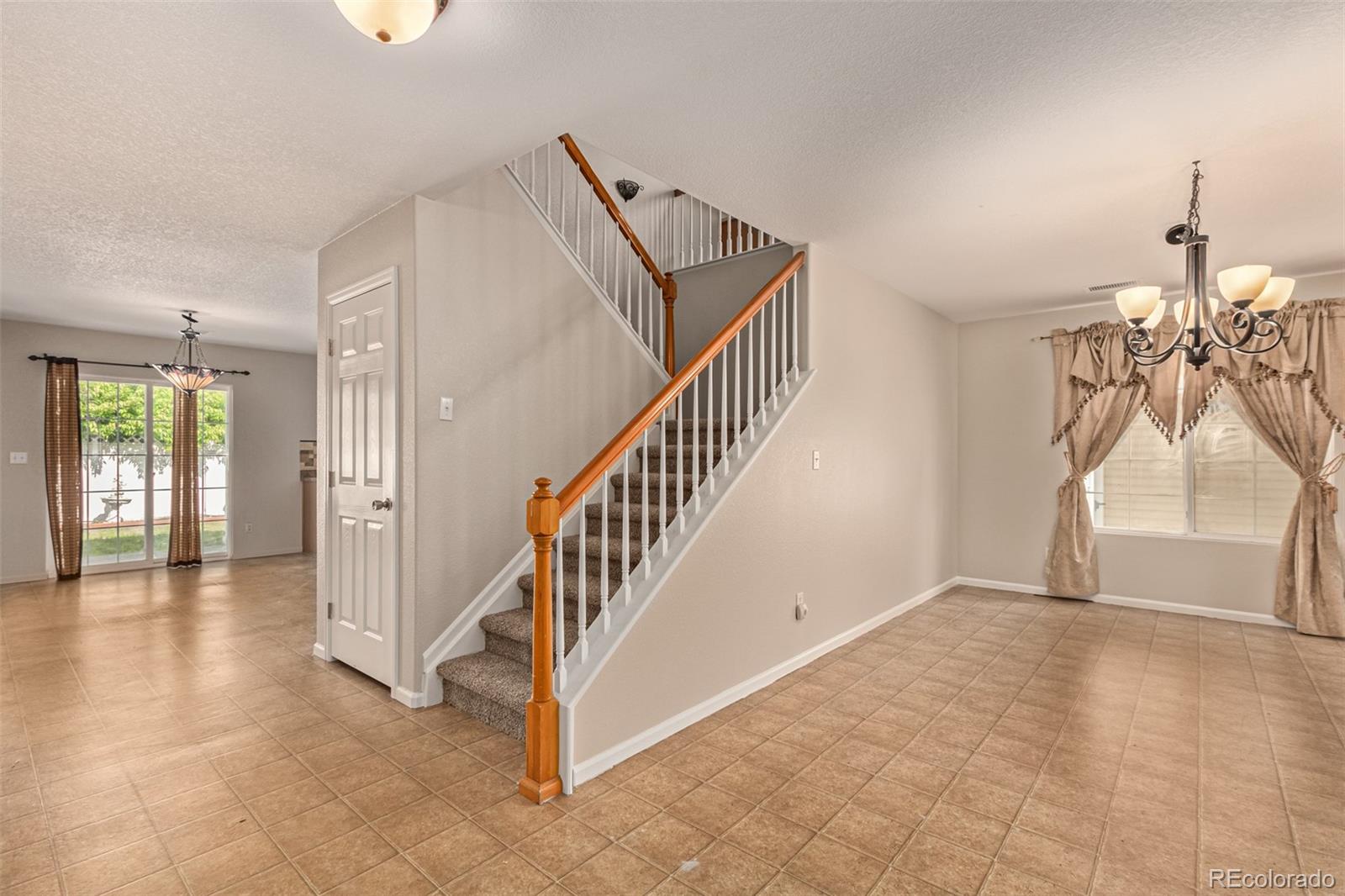5344 North Perth Street Denver, CO 80249 - Photo 17 of 39 a view of entryway and hall with a window