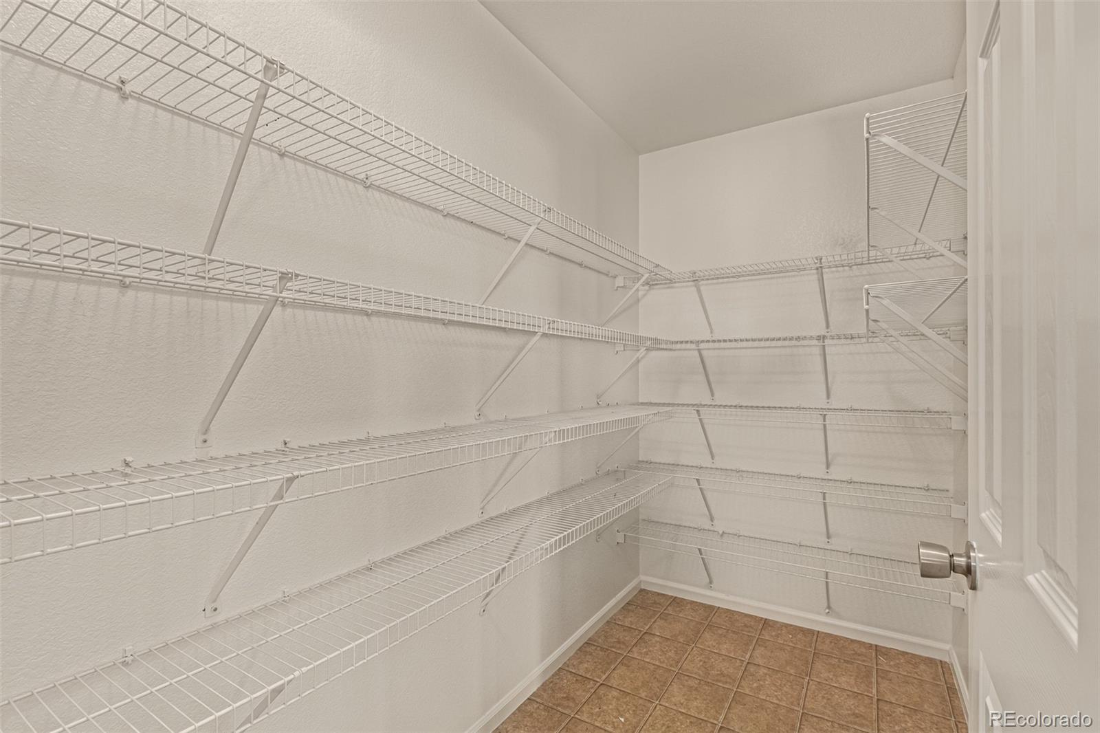 5344 North Perth Street Denver, CO 80249 - Photo 21 of 39 a bathroom with a shower