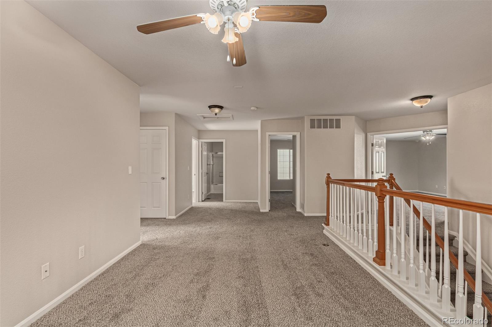 5344 North Perth Street Denver, CO 80249 - Photo 24 of 39 a view of a hallway with workspace