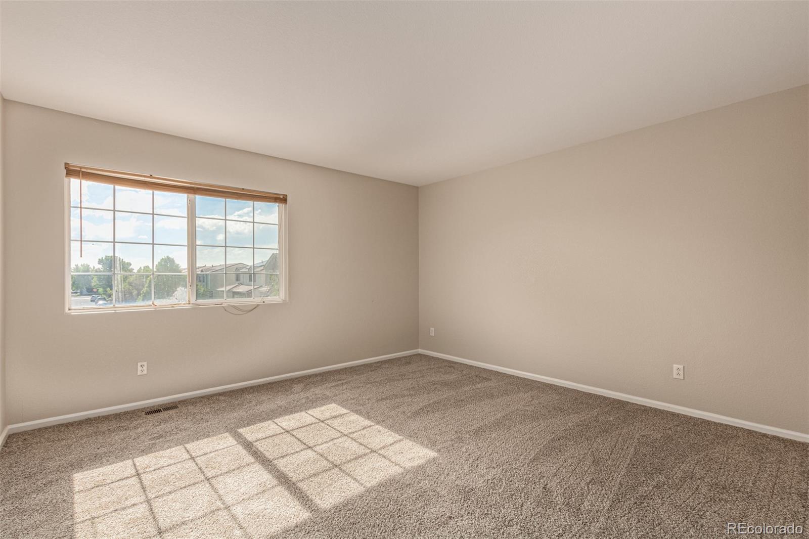 5344 North Perth Street Denver, CO 80249 - Photo 34 of 39 an empty room with windows