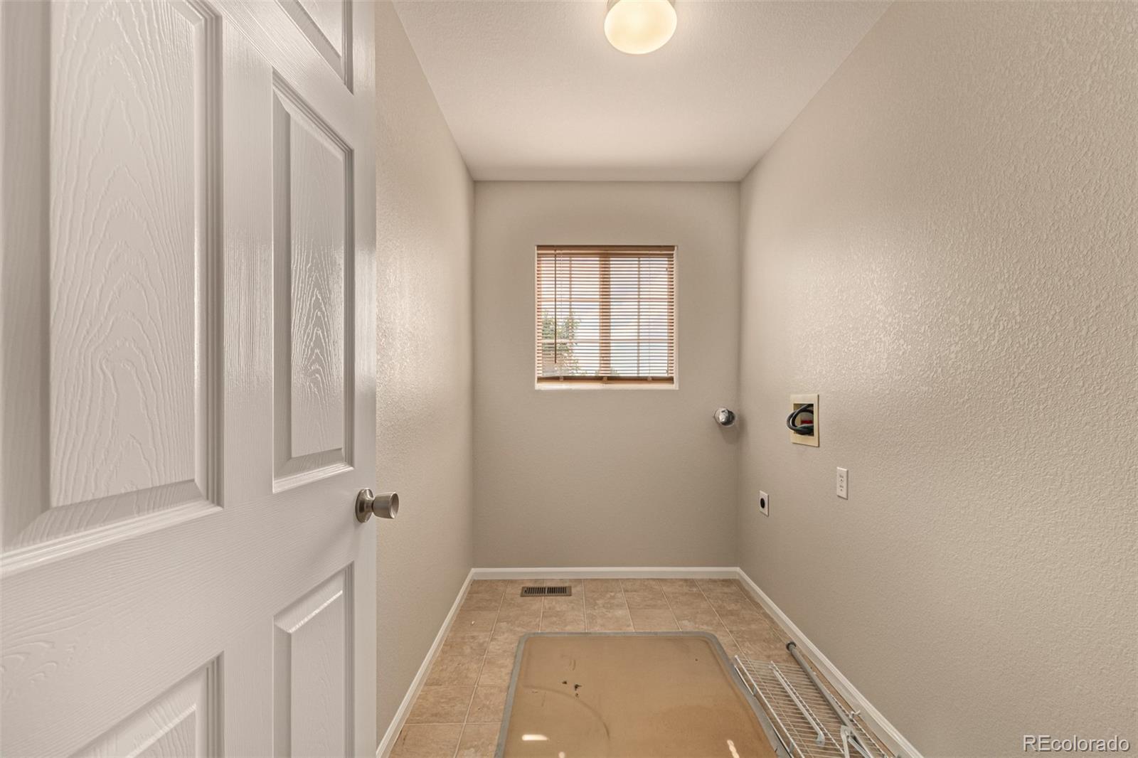 5344 North Perth Street Denver, CO 80249 - Photo 36 of 39 a view of room with window