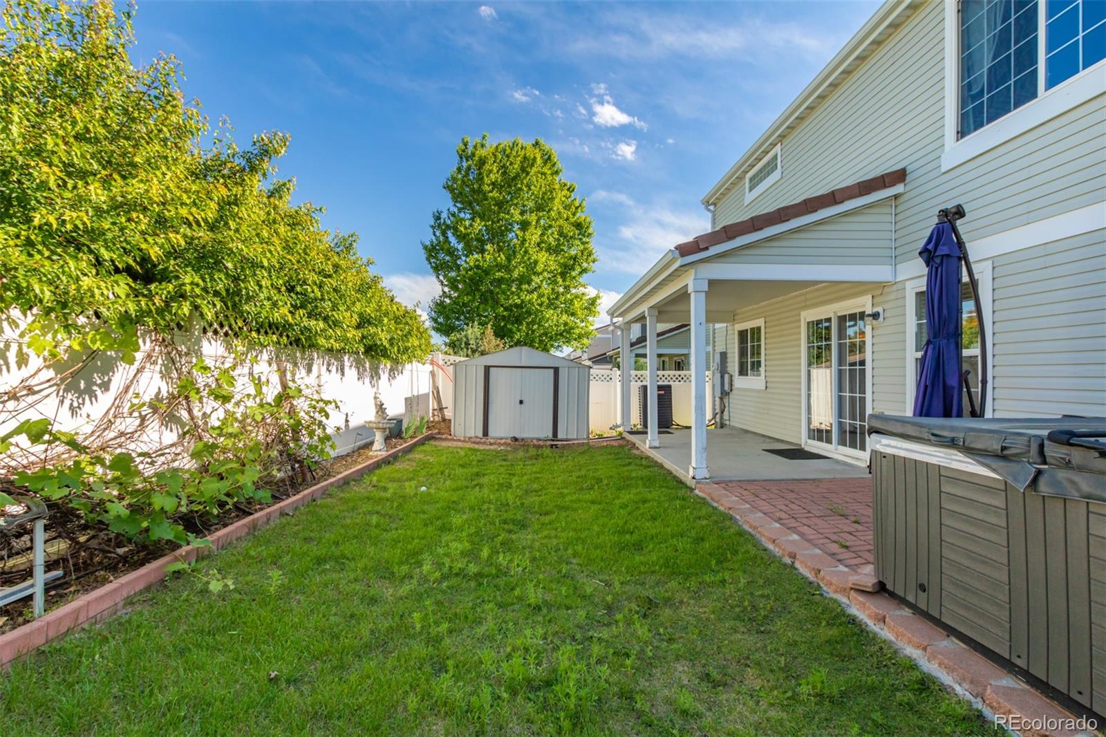 5344 North Perth Street Denver, CO 80249 - Photo 38 of 39 a house view with a garden space