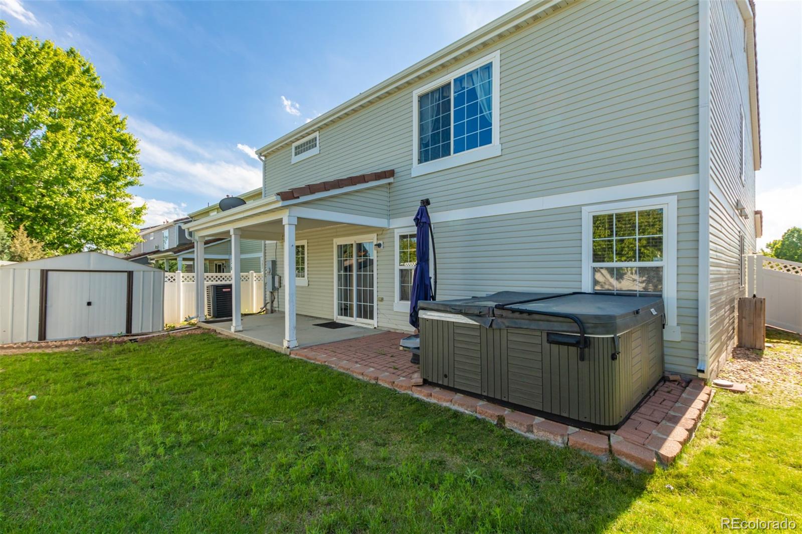 5344 North Perth Street Denver, CO 80249 - Photo 39 of 39 a view of a house with a tub and a yard