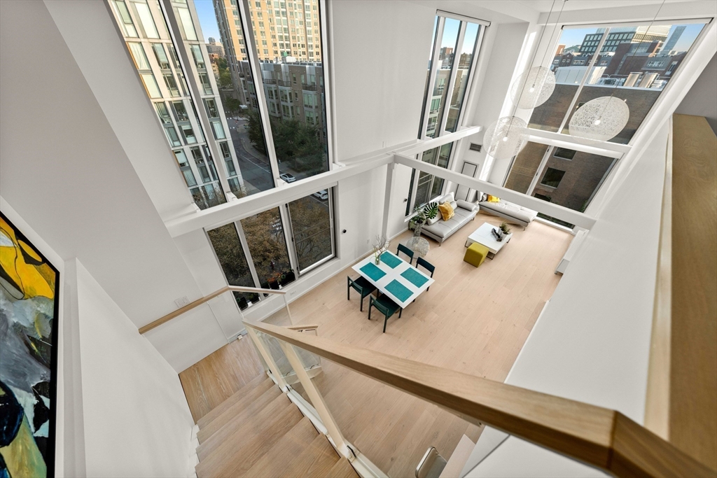 1 Earhart Street, Unit 705 Cambridge, MA 02141 - Photo 16 of 38 a view of living room with furniture and flat screen tv