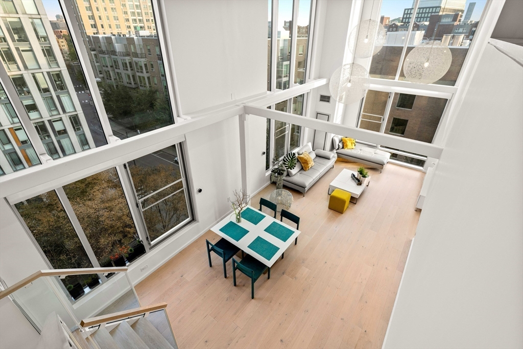 1 Earhart Street, Unit 705 Cambridge, MA 02141 - Photo 17 of 38 a living room with furniture and a window