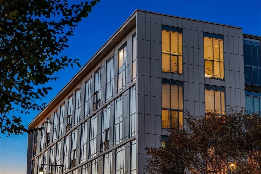 1 Earhart Street, Unit 705 Cambridge, MA 02141 - Photo 38 of 38 a view of building with a yard