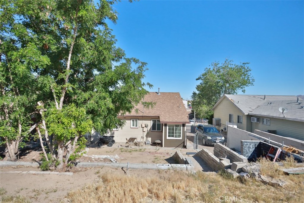 15461 Hesperia Road Victorville, CA 92395 - Photo 22 of 28 a view of a house with a patio