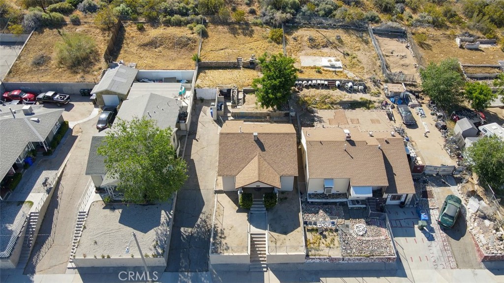 15461 Hesperia Road Victorville, CA 92395 - Photo 26 of 28 an aerial view of residential houses with outdoor space