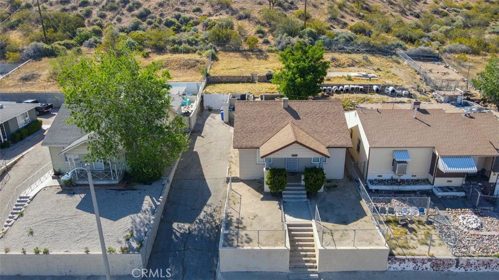15461 Hesperia Road Victorville, CA 92395 - Photo 28 of 28 an aerial view of a house with outdoor space