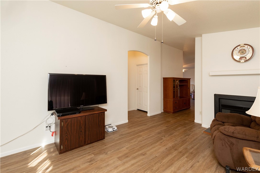 4102 Cibola Road Golden Valley, AZ 86413 - Photo 21 of 71 a living room with furniture and a flat screen tv