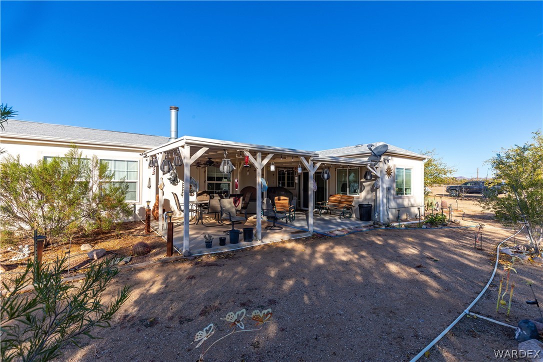 4102 Cibola Road Golden Valley, AZ 86413 - Photo 38 of 71 a view of a car park in front of a house