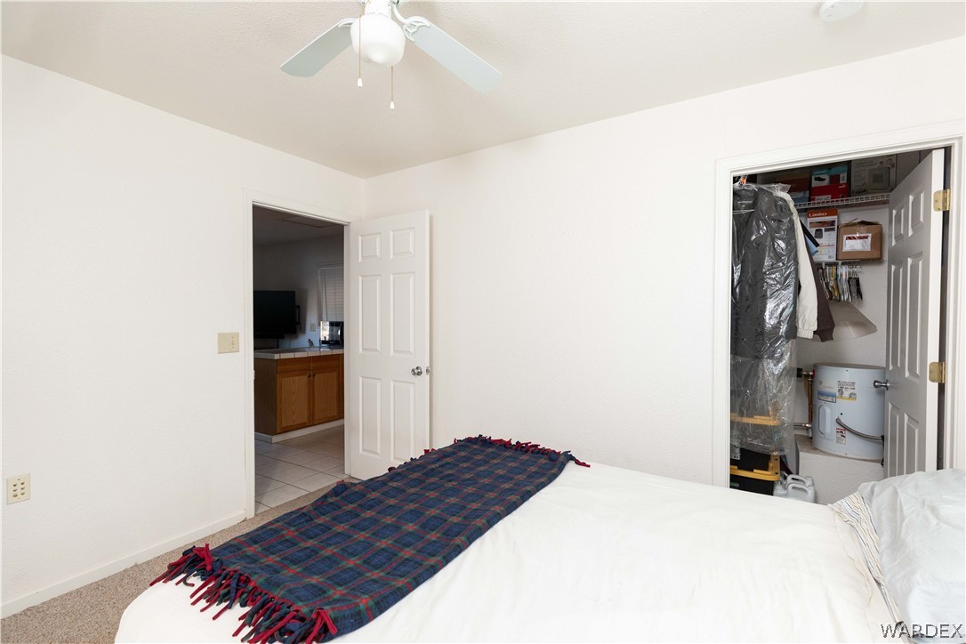 4102 Cibola Road Golden Valley, AZ 86413 - Photo 47 of 71 a bedroom with a bed and a television