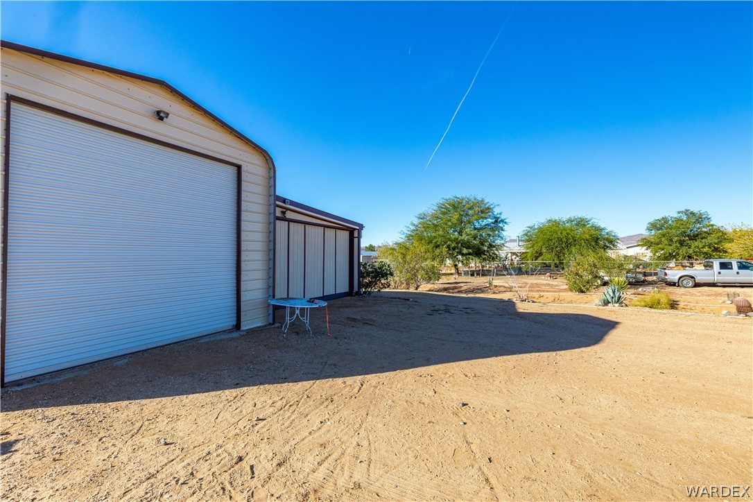 4102 Cibola Road Golden Valley, AZ 86413 - Photo 56 of 71 a view of a backyard of the house