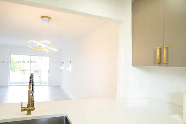 a view of a living room with a window