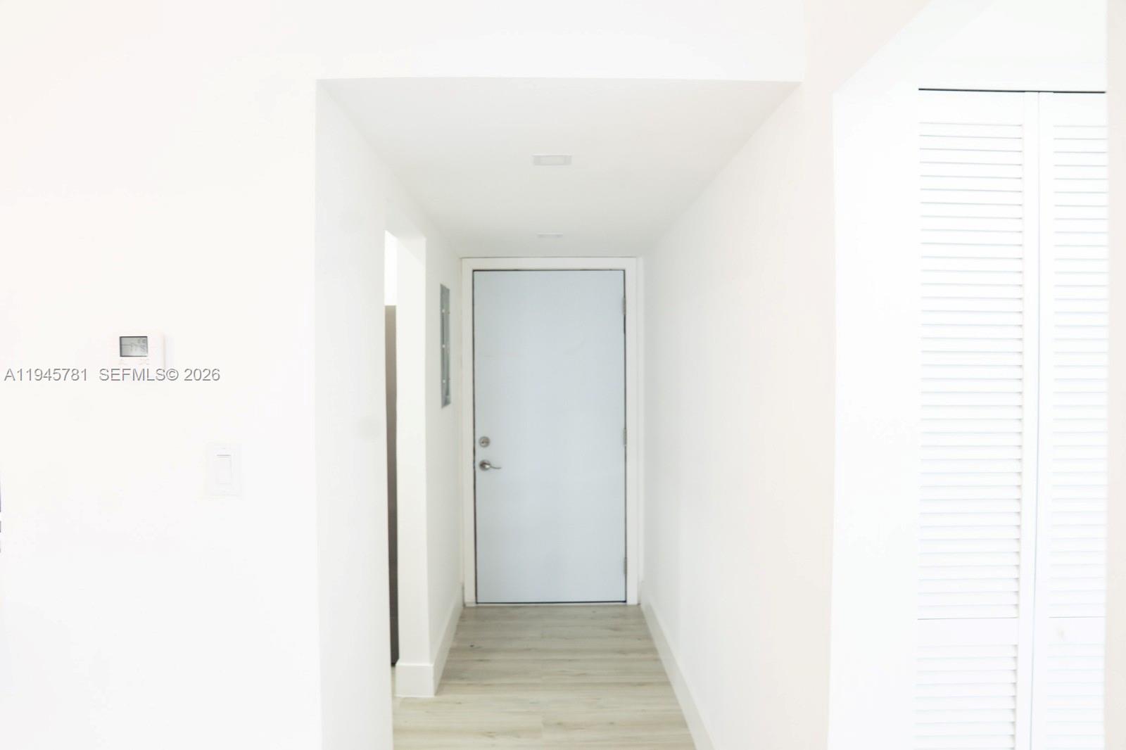 220 Southwest 9th Avenue, Unit 306 Hallandale Beach, FL 33009 - Photo 26 of 30 a view of a hallway