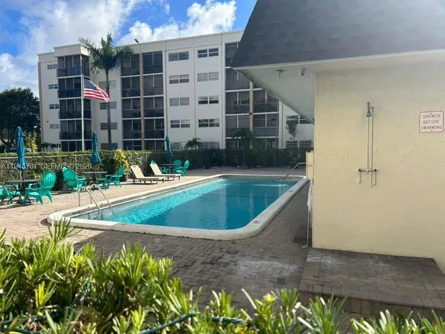 a view of outdoor space yard and swimming pool
