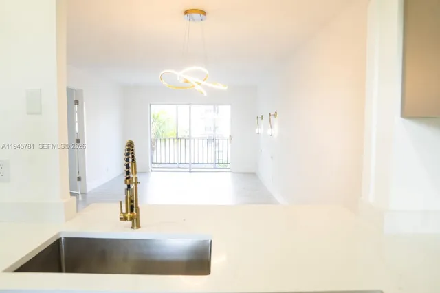 a view of a living room with a window