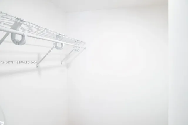 a view of small space with white wall