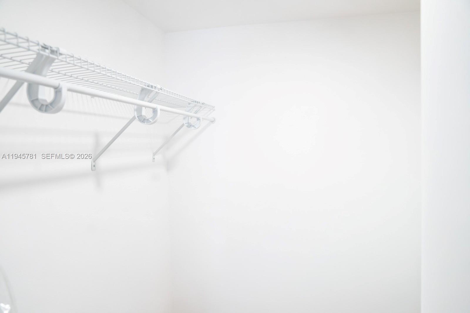 220 Southwest 9th Avenue, Unit 306 Hallandale Beach, FL 33009 - Photo 7 of 30 a view of small space with white wall