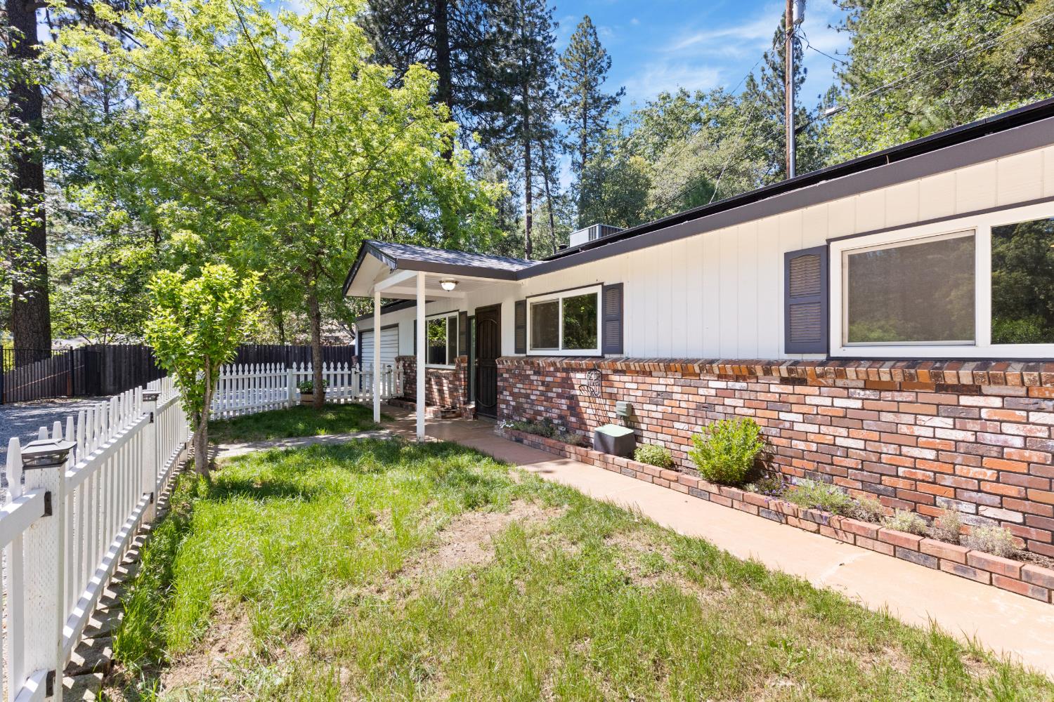 2971 Letitia Avenue Placerville, CA 95667 - Photo 19 of 65 a view of a house with backyard and sitting area