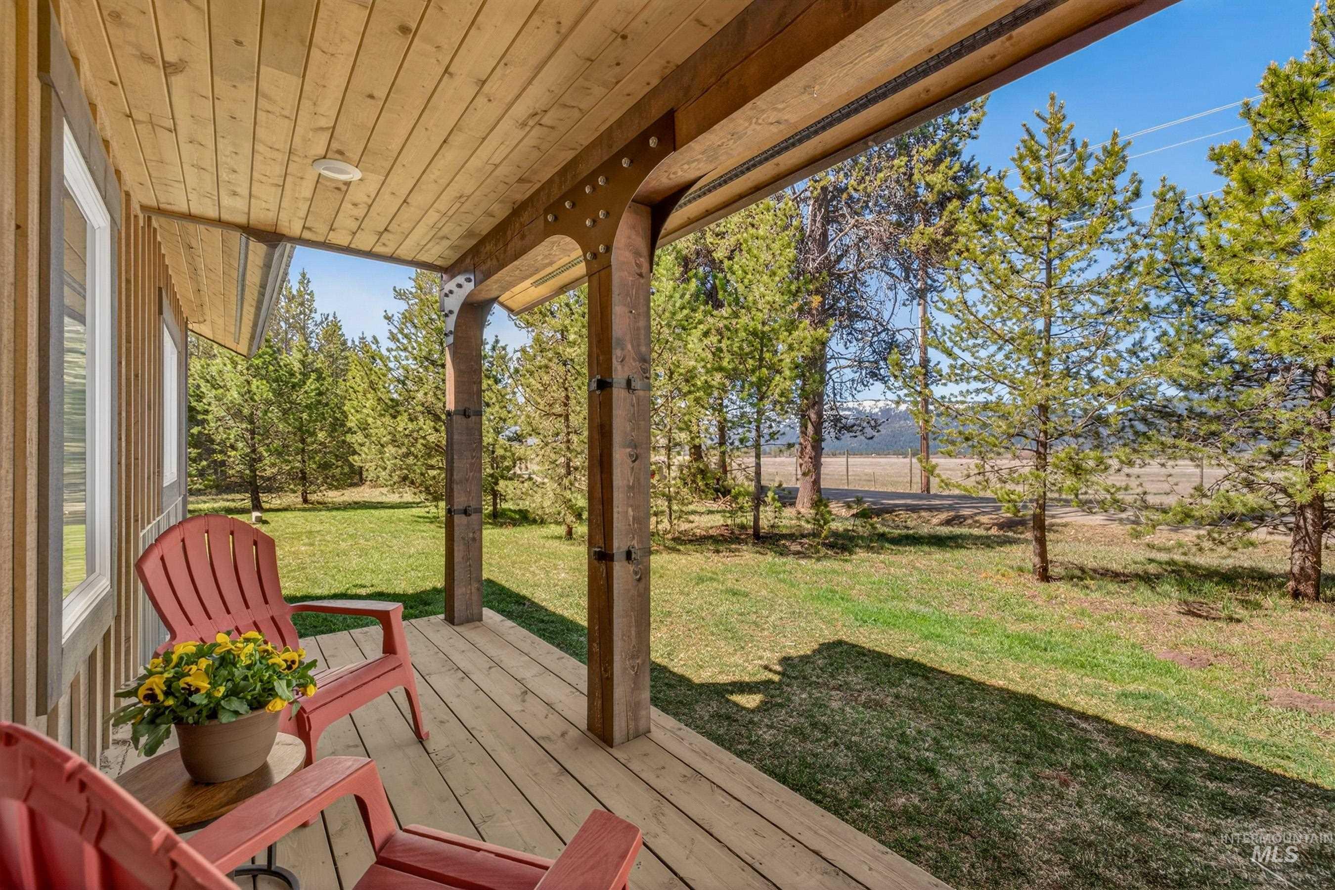 13388 Norwood Road McCall, ID 83638 - Photo 36 of 44 Covered porch featuring wood-finish decking and ceiling