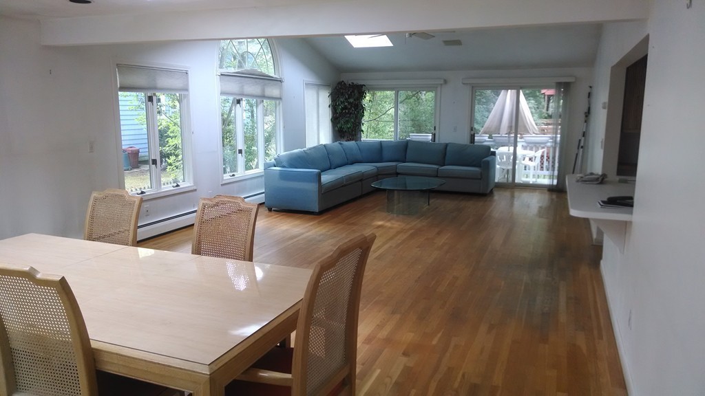 4 York Road Newton, MA 02468 - Photo 5 of 7 a living room with furniture and a large window