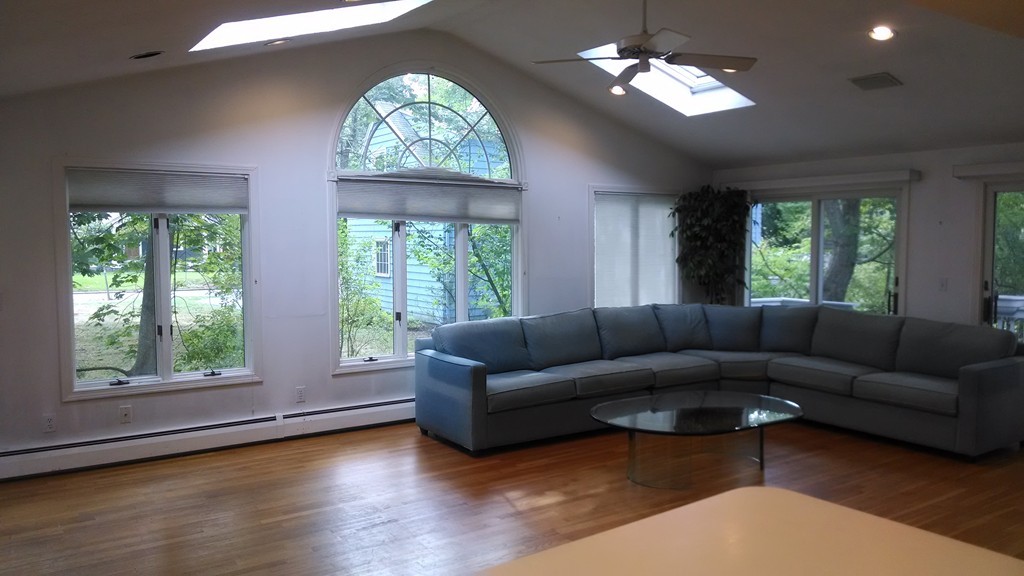4 York Road Newton, MA 02468 - Photo 6 of 7 a living room with furniture and a chandelier