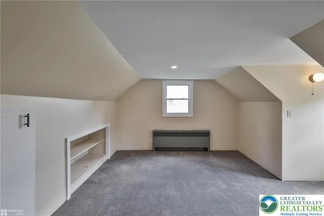 a view of empty room with windows