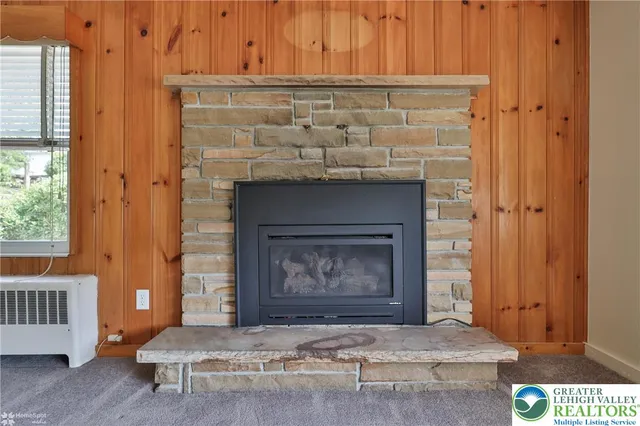 a room with fireplace and a fireplace