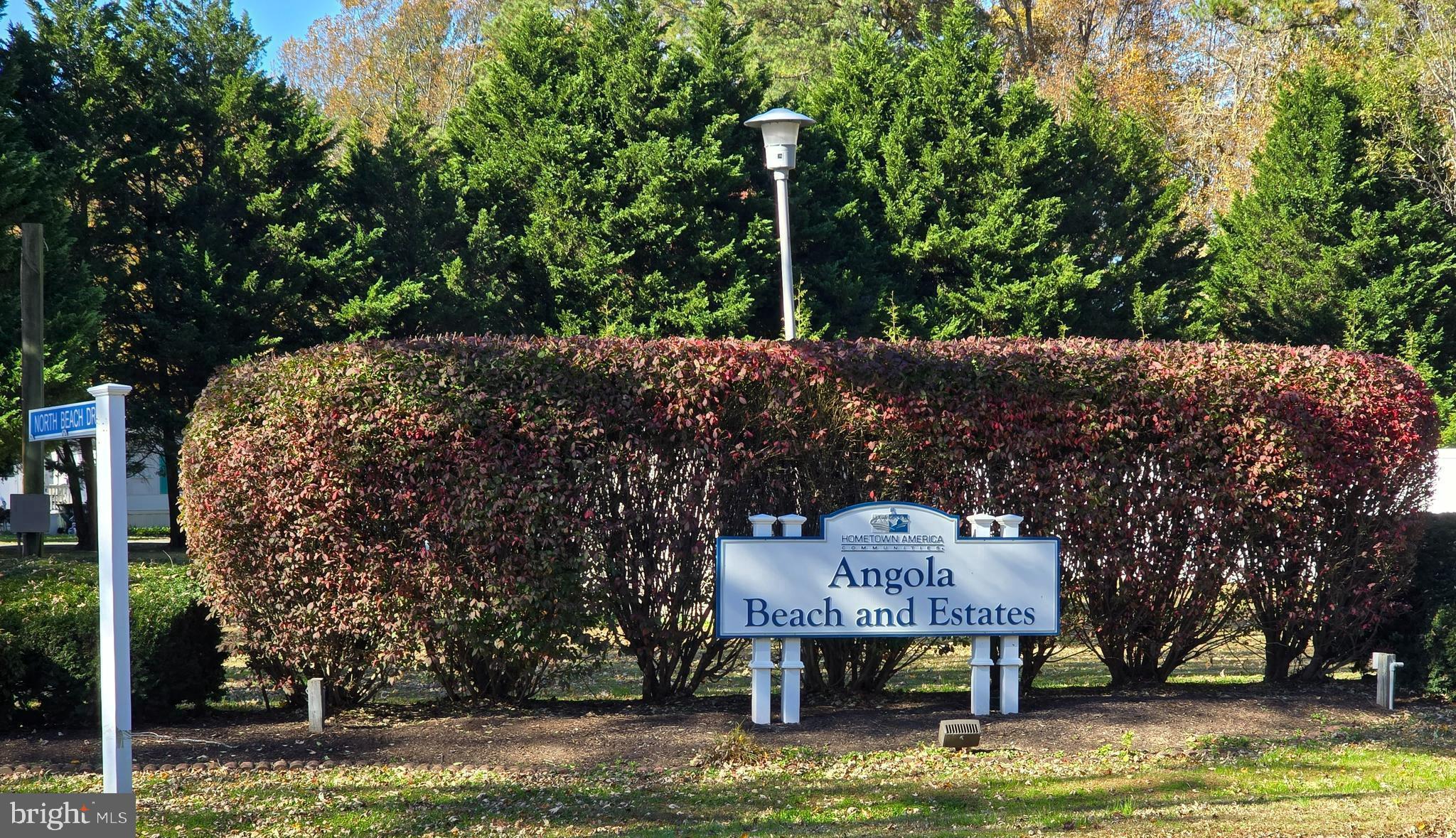 33500 Clover Street Lewes, DE 19958 - Photo 25 of 39 a sign on the side of a road