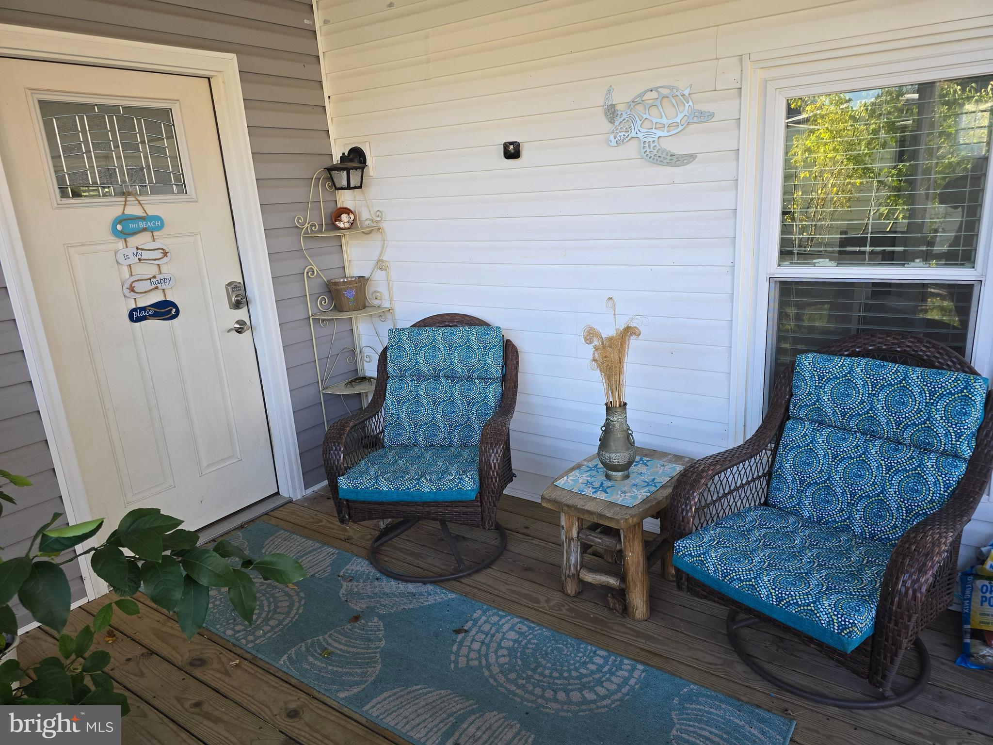 33500 Clover Street Lewes, DE 19958 - Photo 6 of 39 a living room with furniture and a window