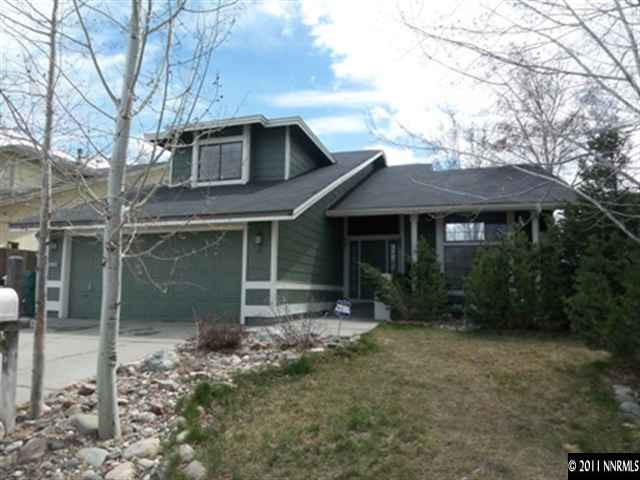 5370 Mountcrest Lane Reno, NV 89523 - Photo 1 of 10 a front view of a house with garden