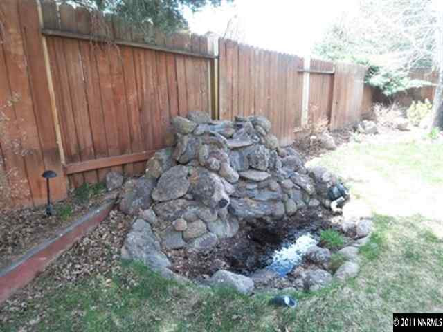 5370 Mountcrest Lane Reno, NV 89523 - Photo 10 of 10 a view of outdoor space with wooden fence
