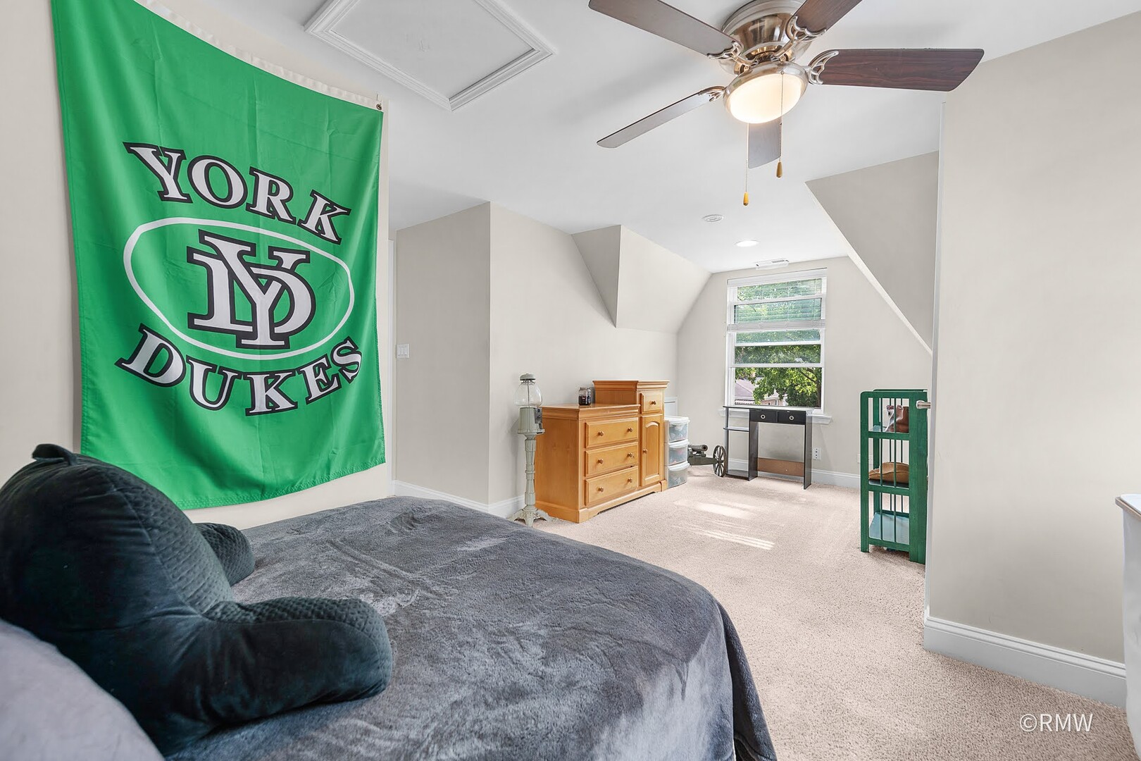 735 Spring Road Elmhurst, IL 60126 - Photo 14 of 34 a bed room with a bed and a chandelier