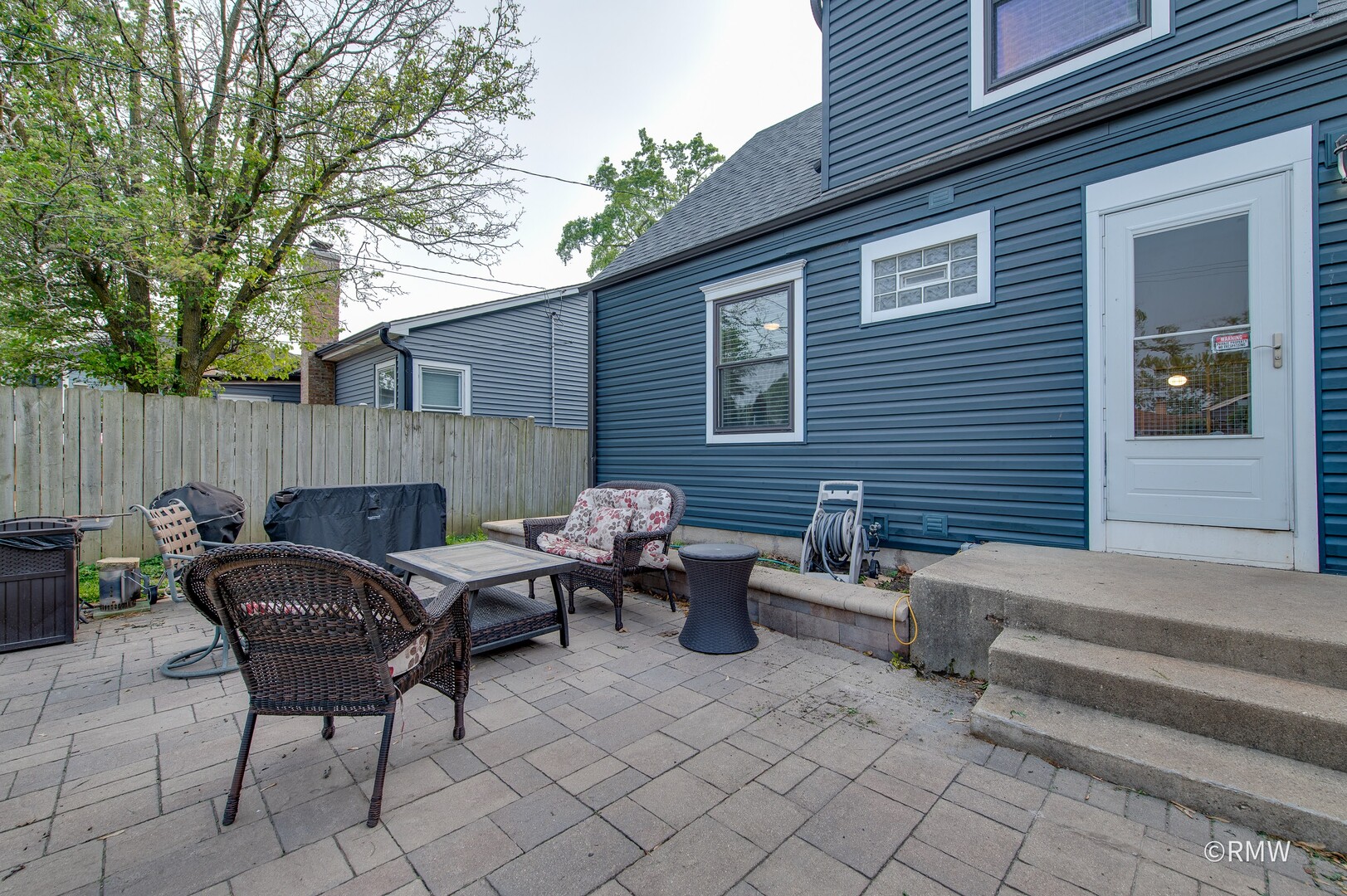 735 Spring Road Elmhurst, IL 60126 - Photo 30 of 34 a view of backyard with outdoor seating