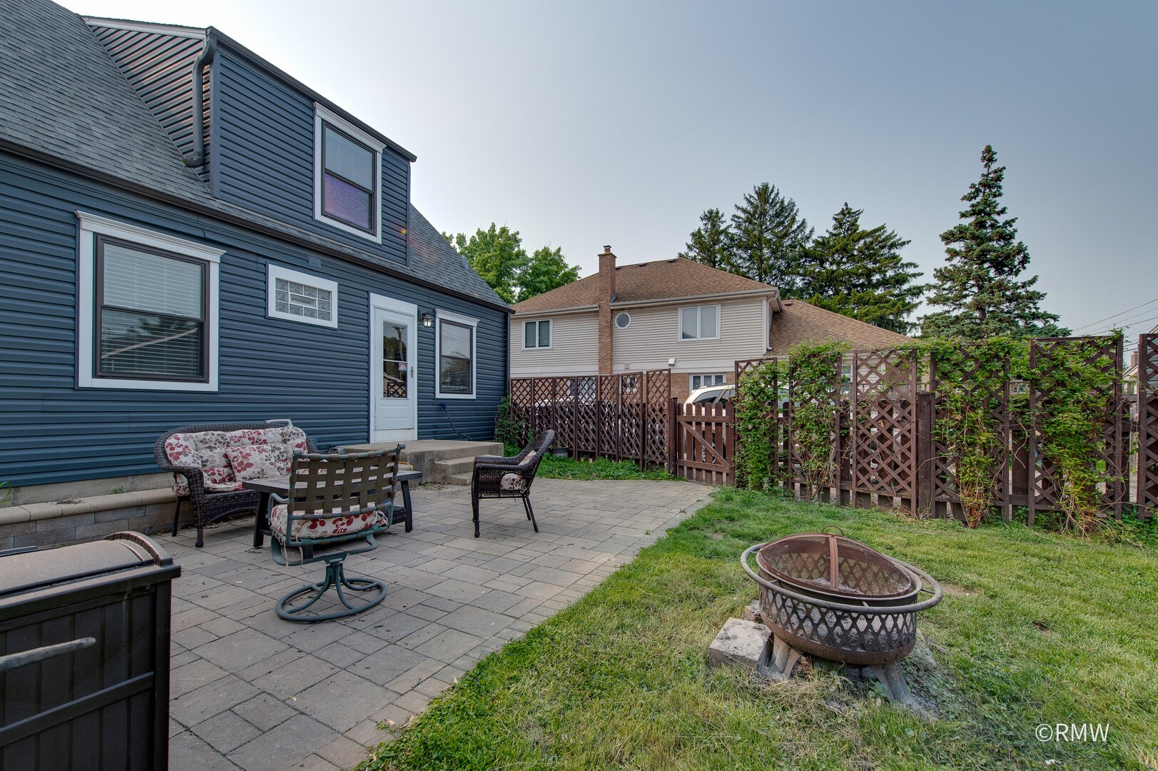 735 Spring Road Elmhurst, IL 60126 - Photo 32 of 34 a view of a house with a backyard and a patio