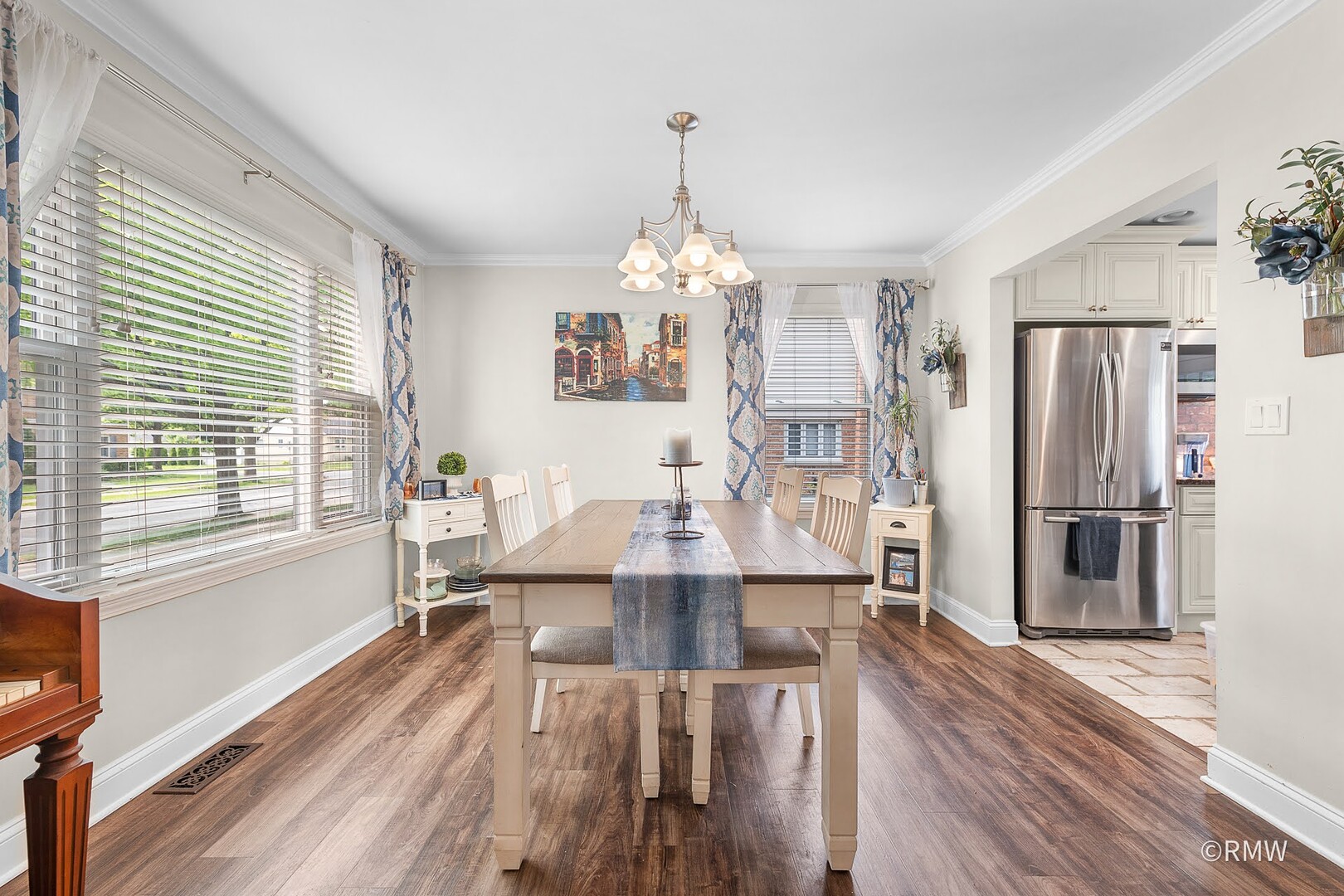 735 Spring Road Elmhurst, IL 60126 - Photo 6 of 34 a view of a dining room with furniture window and wooden floor