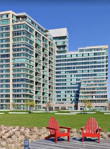 a room with furniture pool table and windows